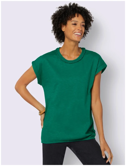 Mannequin qui porte un t-shirt vert